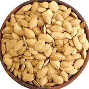 تخمه کدو 2 آتیشه ریخته شده در ظرف
